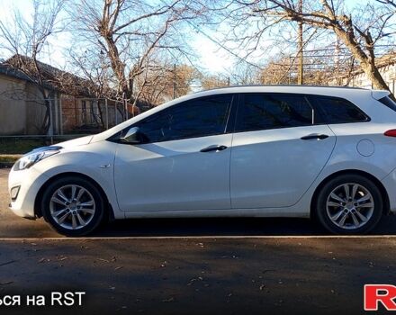 Білий Хендай i30, об'ємом двигуна 1.4 л та пробігом 206 тис. км за 8790 $, фото 6 на Automoto.ua