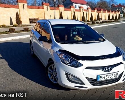 Білий Хендай i30, об'ємом двигуна 1.4 л та пробігом 206 тис. км за 8790 $, фото 11 на Automoto.ua