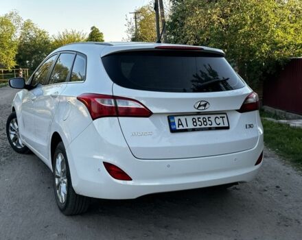 Білий Хендай i30, об'ємом двигуна 0.16 л та пробігом 225 тис. км за 11000 $, фото 9 на Automoto.ua