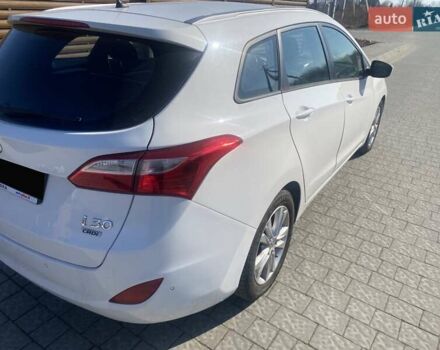 Білий Хендай i30, об'ємом двигуна 1.6 л та пробігом 260 тис. км за 11000 $, фото 2 на Automoto.ua