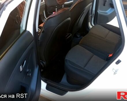 Білий Хендай i30, об'ємом двигуна 1.4 л та пробігом 206 тис. км за 8790 $, фото 7 на Automoto.ua