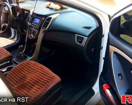 Білий Хендай i30, об'ємом двигуна 1.4 л та пробігом 206 тис. км за 8790 $, фото 2 на Automoto.ua