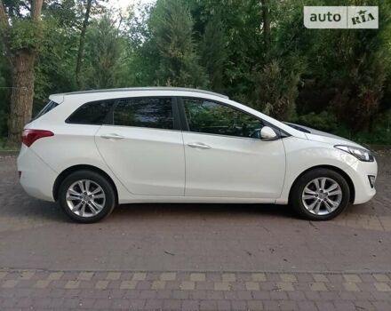 Білий Хендай i30, об'ємом двигуна 1.6 л та пробігом 120 тис. км за 9800 $, фото 7 на Automoto.ua