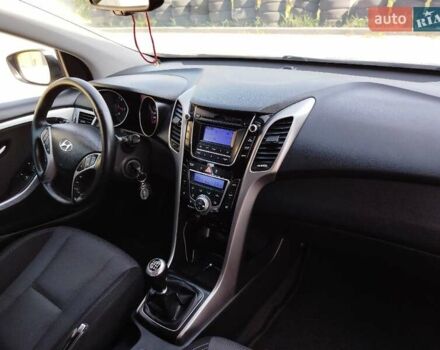 Хендай i30 2014 в Хмельницком на Automoto.ua Белый Хендай i30, объемом двигателя 1.6 л и пробегом 234 тыс. км за 7999 $, фото 17 на Automoto.ua
