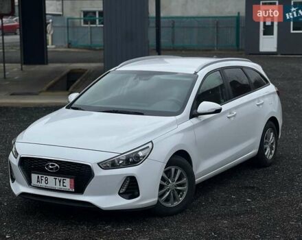 Білий Хендай i30, об'ємом двигуна 1.6 л та пробігом 157 тис. км за 11700 $, фото 3 на Automoto.ua