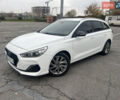 Белый Хендай i30, объемом двигателя 1.58 л и пробегом 218 тыс. км за 11990 $, фото 1 на Automoto.ua