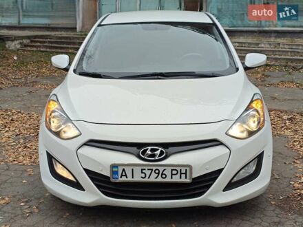 Белый Хендай i30, объемом двигателя 1.4 л и пробегом 105 тыс. км за 8400 $, фото 1 на Automoto.ua