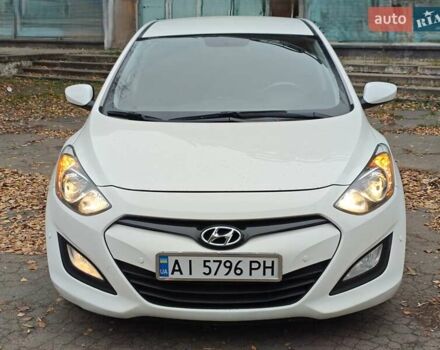 Белый Хендай i30, объемом двигателя 1.4 л и пробегом 105 тыс. км за 8400 $, фото 1 на Automoto.ua