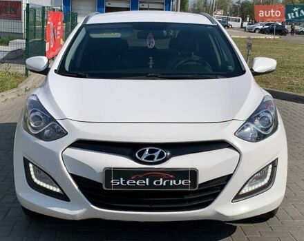 Белый Хендай i30, объемом двигателя 1.58 л и пробегом 245 тыс. км за 9400 $, фото 1 на Automoto.ua