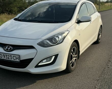 Белый Хендай i30, объемом двигателя 1.4 л и пробегом 230 тыс. км за 8198 $, фото 1 на Automoto.ua