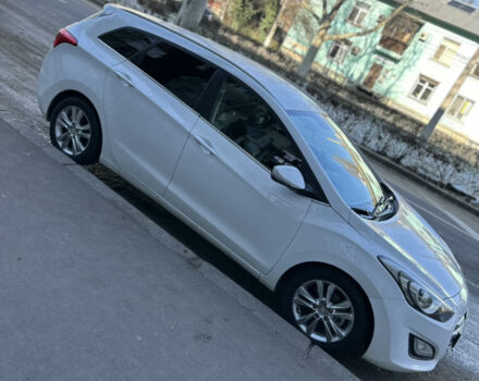 Белый Хендай i30, объемом двигателя 1.58 л и пробегом 201 тыс. км за 8850 $, фото 1 на Automoto.ua
