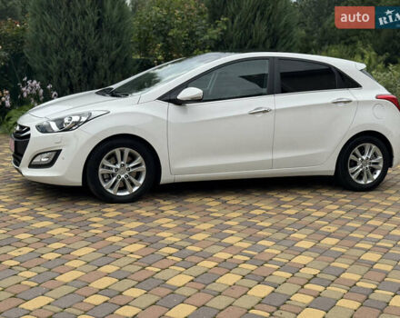 Білий Хендай i30, об'ємом двигуна 1.6 л та пробігом 108 тис. км за 14200 $, фото 1 на Automoto.ua
