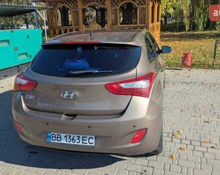 Бежевий Хендай i30, об'ємом двигуна 1.4 л та пробігом 156 тис. км за 8000 $, фото 3 на Automoto.ua