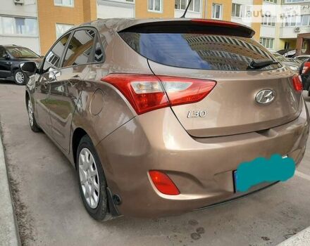 Бежевий Хендай i30, об'ємом двигуна 1.4 л та пробігом 160 тис. км за 7650 $, фото 3 на Automoto.ua