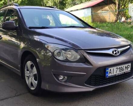 Бежевий Хендай i30, об'ємом двигуна 1.58 л та пробігом 290 тис. км за 7300 $, фото 4 на Automoto.ua