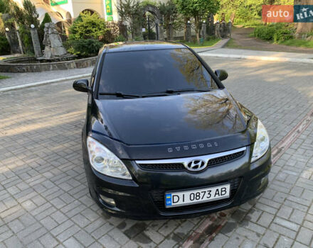 Черный Хендай i30, объемом двигателя 1.6 л и пробегом 233 тыс. км за 6099 $, фото 1 на Automoto.ua