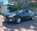 Чорний Хендай i30, об'ємом двигуна 1.4 л та пробігом 236 тис. км за 4899 $, фото 1 на Automoto.ua