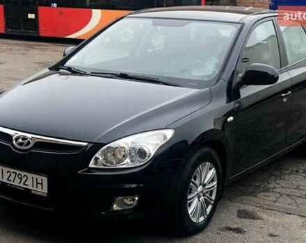 Черный Хендай i30, объемом двигателя 1.59 л и пробегом 150 тыс. км за 5950 $, фото 1 на Automoto.ua