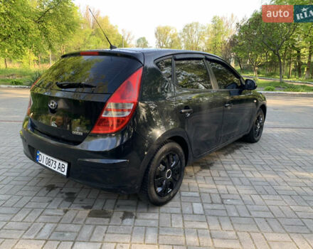 Черный Хендай i30, объемом двигателя 1.6 л и пробегом 233 тыс. км за 6099 $, фото 6 на Automoto.ua