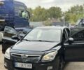 Черный Хендай i30, объемом двигателя 1.6 л и пробегом 240 тыс. км за 5999 $, фото 1 на Automoto.ua