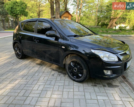 Черный Хендай i30, объемом двигателя 1.6 л и пробегом 233 тыс. км за 6099 $, фото 4 на Automoto.ua