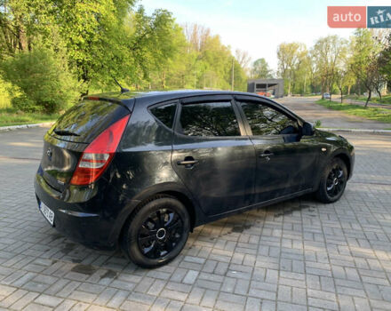 Черный Хендай i30, объемом двигателя 1.6 л и пробегом 233 тыс. км за 6099 $, фото 5 на Automoto.ua