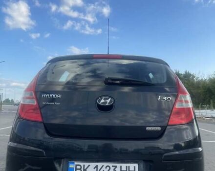 Черный Хендай i30, объемом двигателя 1.58 л и пробегом 227 тыс. км за 5900 $, фото 1 на Automoto.ua