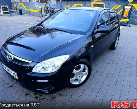Черный Хендай i30, объемом двигателя 1.4 л и пробегом 170 тыс. км за 5800 $, фото 6 на Automoto.ua