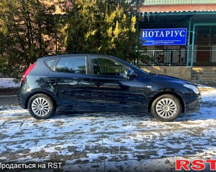 Чорний Хендай i30, об'ємом двигуна 1.4 л та пробігом 195 тис. км за 5650 $, фото 1 на Automoto.ua