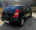 Черный Хендай i30, объемом двигателя 1.4 л и пробегом 171 тыс. км за 5400 $, фото 1 на Automoto.ua