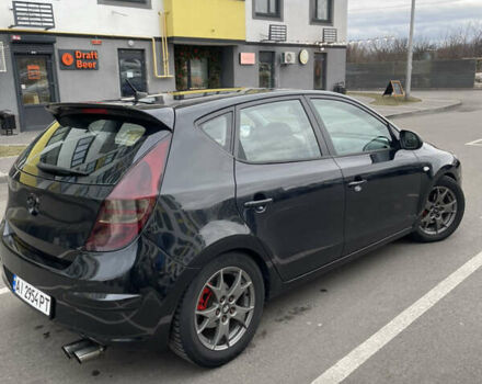Черный Хендай i30, объемом двигателя 1.98 л и пробегом 227 тыс. км за 6500 $, фото 4 на Automoto.ua