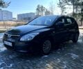 Чорний Хендай i30, об'ємом двигуна 1.4 л та пробігом 195 тис. км за 5650 $, фото 5 на Automoto.ua