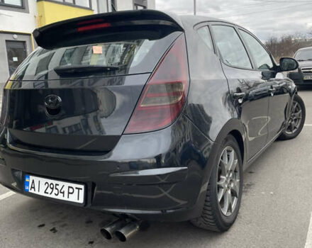 Черный Хендай i30, объемом двигателя 1.98 л и пробегом 227 тыс. км за 6500 $, фото 6 на Automoto.ua