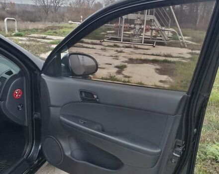 Чорний Хендай i30, об'ємом двигуна 1.6 л та пробігом 365 тис. км за 5000 $, фото 18 на Automoto.ua