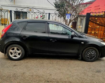 Чорний Хендай i30, об'ємом двигуна 1.6 л та пробігом 390 тис. км за 5300 $, фото 2 на Automoto.ua