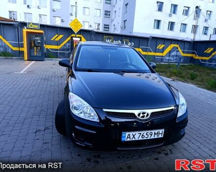 Черный Хендай i30, объемом двигателя 1.4 л и пробегом 170 тыс. км за 5800 $, фото 2 на Automoto.ua