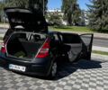 Черный Хендай i30, объемом двигателя 1.4 л и пробегом 265 тыс. км за 5600 $, фото 1 на Automoto.ua