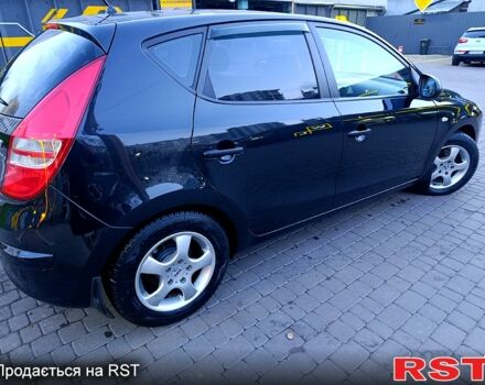 Черный Хендай i30, объемом двигателя 1.4 л и пробегом 170 тыс. км за 5800 $, фото 5 на Automoto.ua