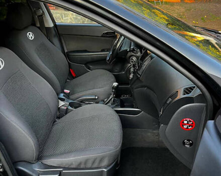 Чорний Хендай i30, об'ємом двигуна 1.58 л та пробігом 240 тис. км за 6100 $, фото 5 на Automoto.ua
