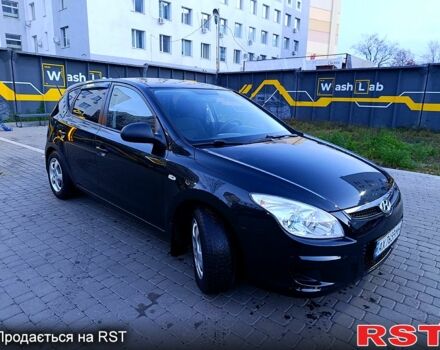 Черный Хендай i30, объемом двигателя 1.4 л и пробегом 170 тыс. км за 5800 $, фото 1 на Automoto.ua