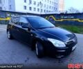 Черный Хендай i30, объемом двигателя 1.4 л и пробегом 170 тыс. км за 5800 $, фото 1 на Automoto.ua