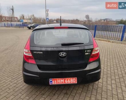 Чорний Хендай i30, об'ємом двигуна 1.4 л та пробігом 161 тис. км за 5700 $, фото 5 на Automoto.ua