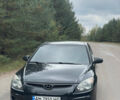 Черный Хендай i30, объемом двигателя 1.4 л и пробегом 223 тыс. км за 5500 $, фото 1 на Automoto.ua