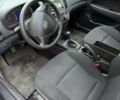 Черный Хендай i30, объемом двигателя 1.4 л и пробегом 174 тыс. км за 4800 $, фото 1 на Automoto.ua