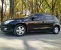 Черный Хендай i30, объемом двигателя 1.6 л и пробегом 290 тыс. км за 5500 $, фото 1 на Automoto.ua