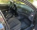 Черный Хендай i30, объемом двигателя 1.4 л и пробегом 275 тыс. км за 4700 $, фото 6 на Automoto.ua