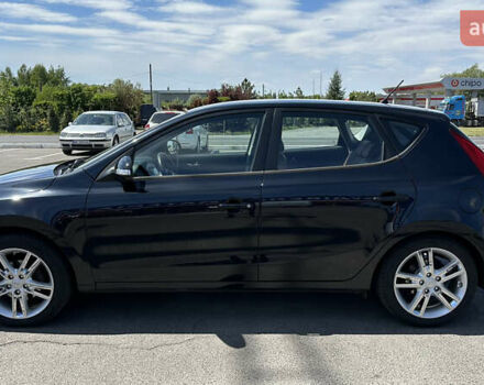 Черный Хендай i30, объемом двигателя 1.6 л и пробегом 194 тыс. км за 9700 $, фото 9 на Automoto.ua