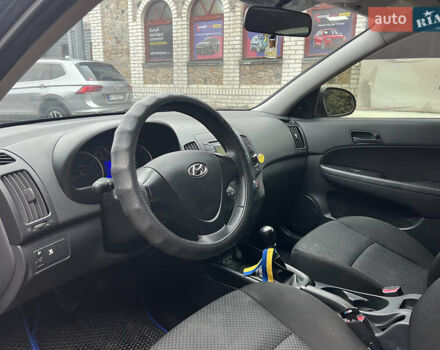 Черный Хендай i30, объемом двигателя 1.4 л и пробегом 240 тыс. км за 6000 $, фото 15 на Automoto.ua