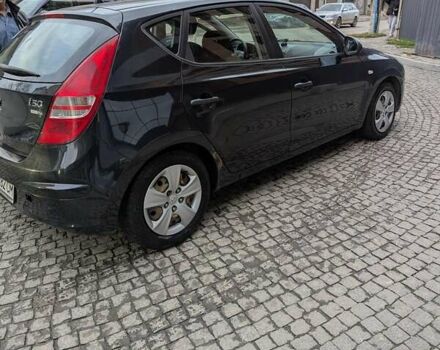 Черный Хендай i30, объемом двигателя 1.4 л и пробегом 174 тыс. км за 4800 $, фото 13 на Automoto.ua