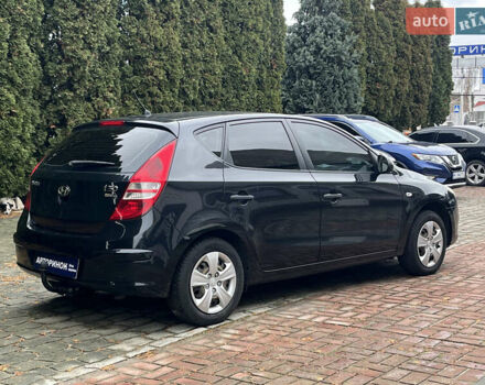 Черный Хендай i30, объемом двигателя 1.4 л и пробегом 240 тыс. км за 6000 $, фото 3 на Automoto.ua